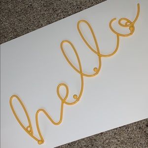 Yellow Cursive “Hello” Rack